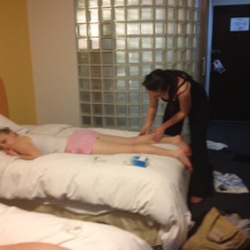Rachel performing acupuncture on Kendall Reid